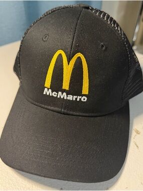 Black Mesh-Back Trucker Cap with Yellow Logo